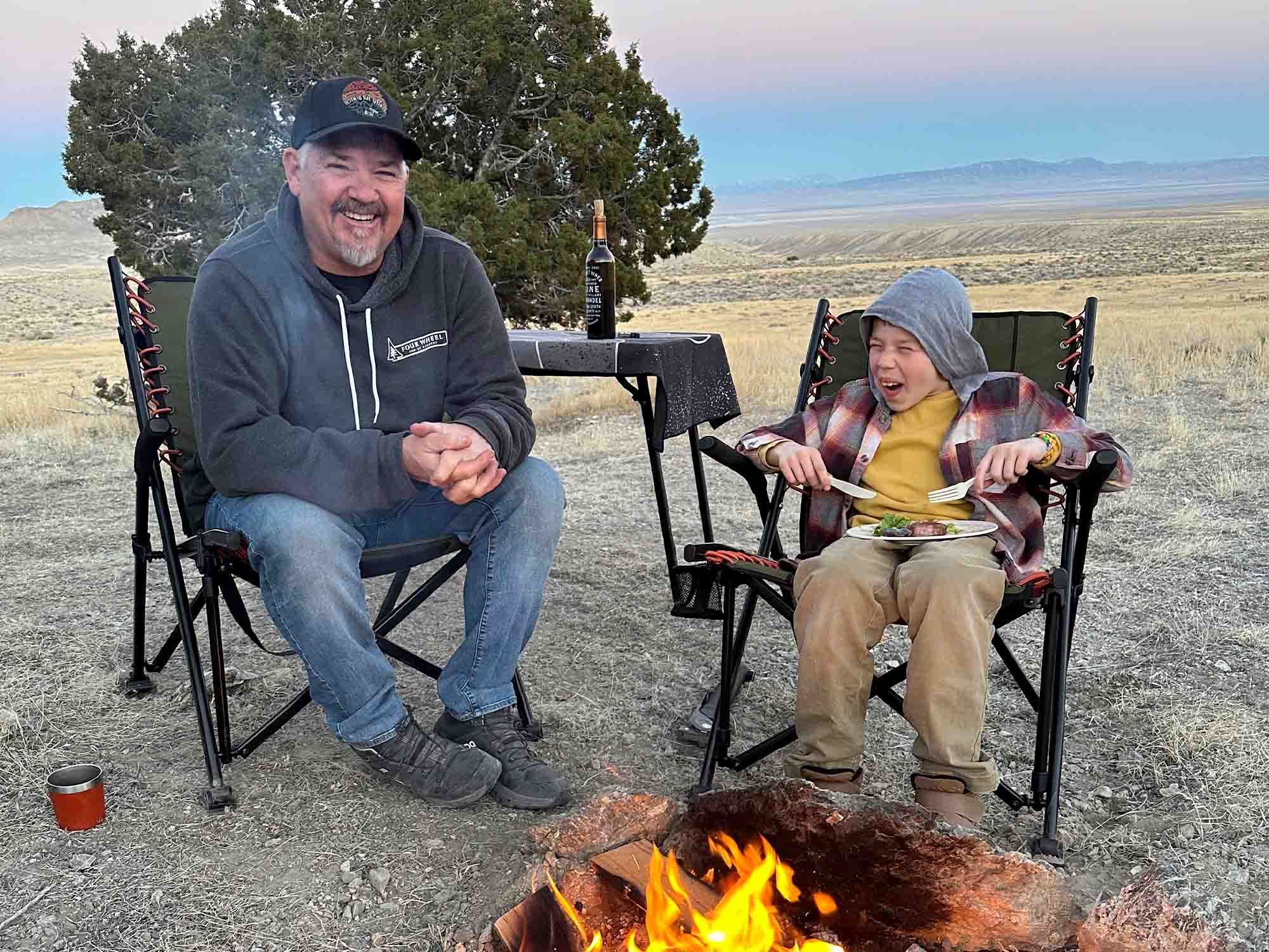 Camping With Kids: Tips For a Smooth Overland Adventure - Sitting Around Campfire